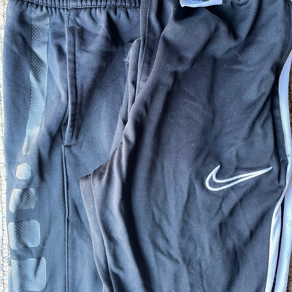 2 pairs of Blk Youth SML/7 Nike Dri-Fit.